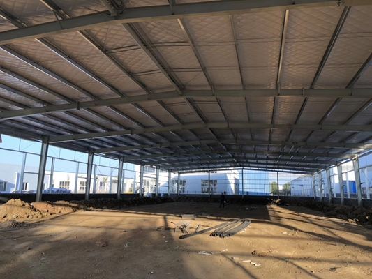 Construire rapidement un atelier de construction préfabriquée économique en acier avec une base en acier