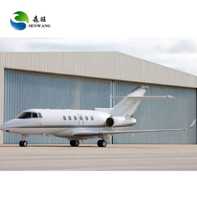 Hangar d'avion préfabriqué avec toit en acier ondulé et conception personnalisée pour une structure de stationnement d'avion optimale